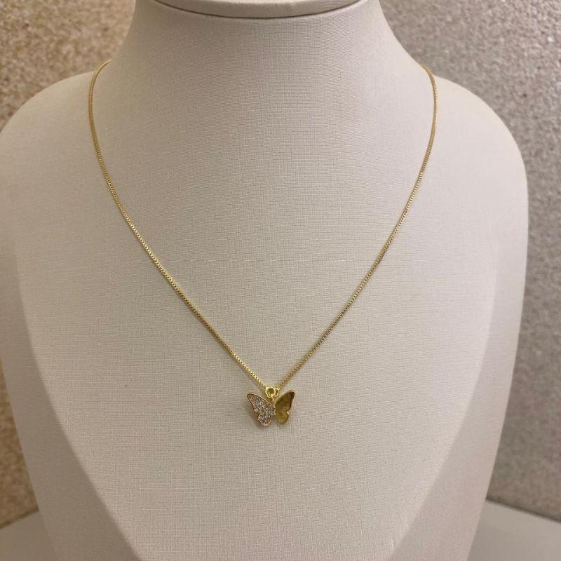 Corrente com pingente borboleta metade craveja