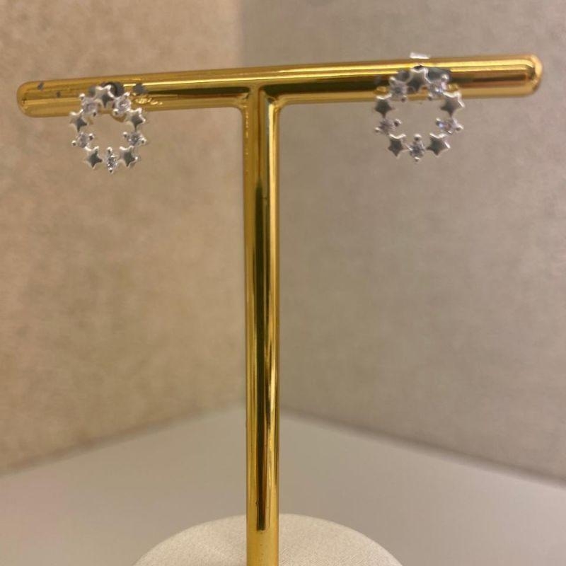 Brinco com estrelas e zircônia redondo P