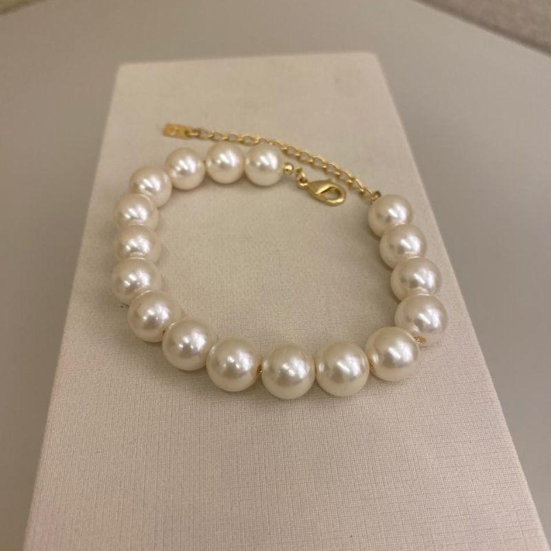 Pulseira de perolas